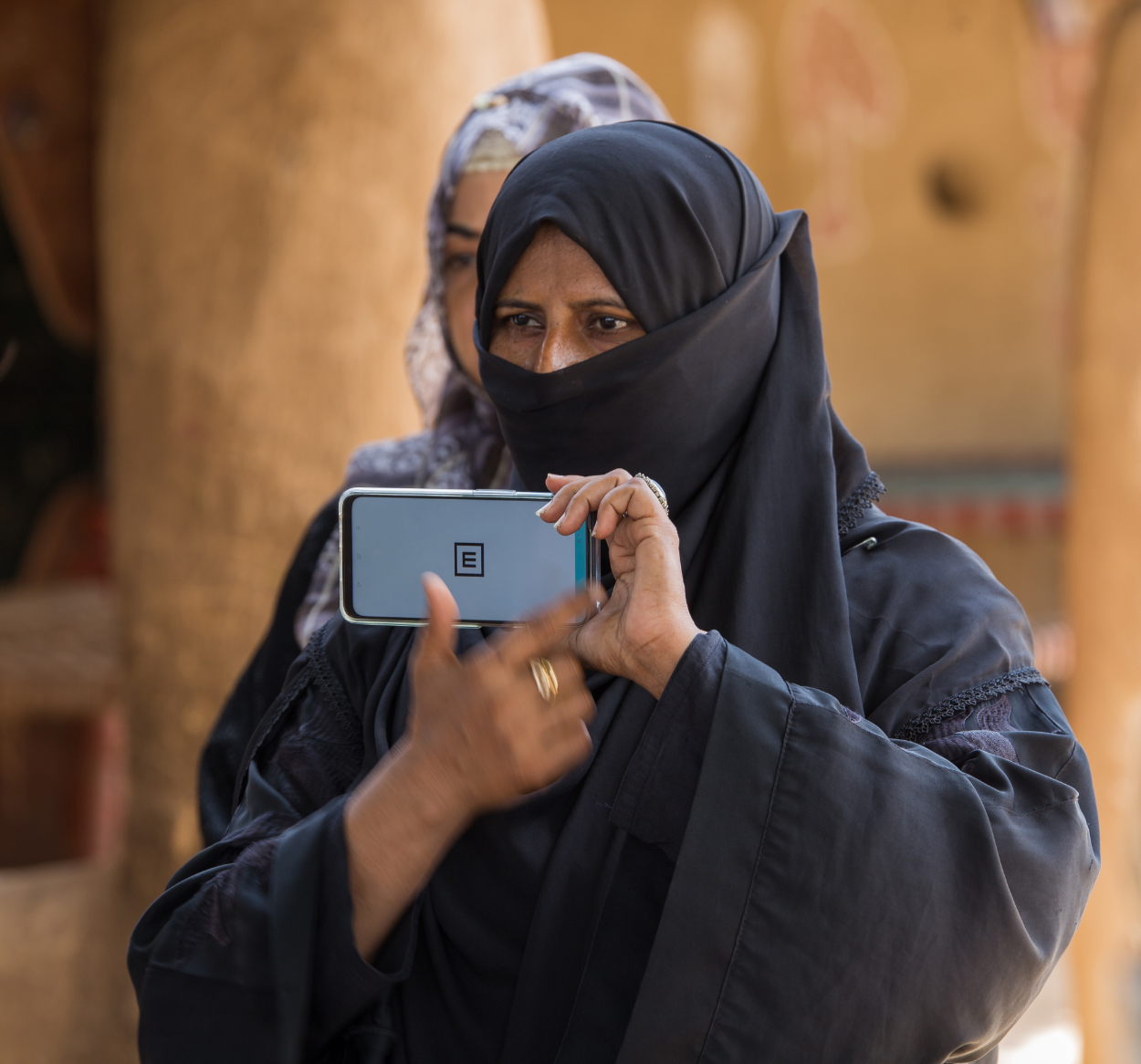 Women using Peek app